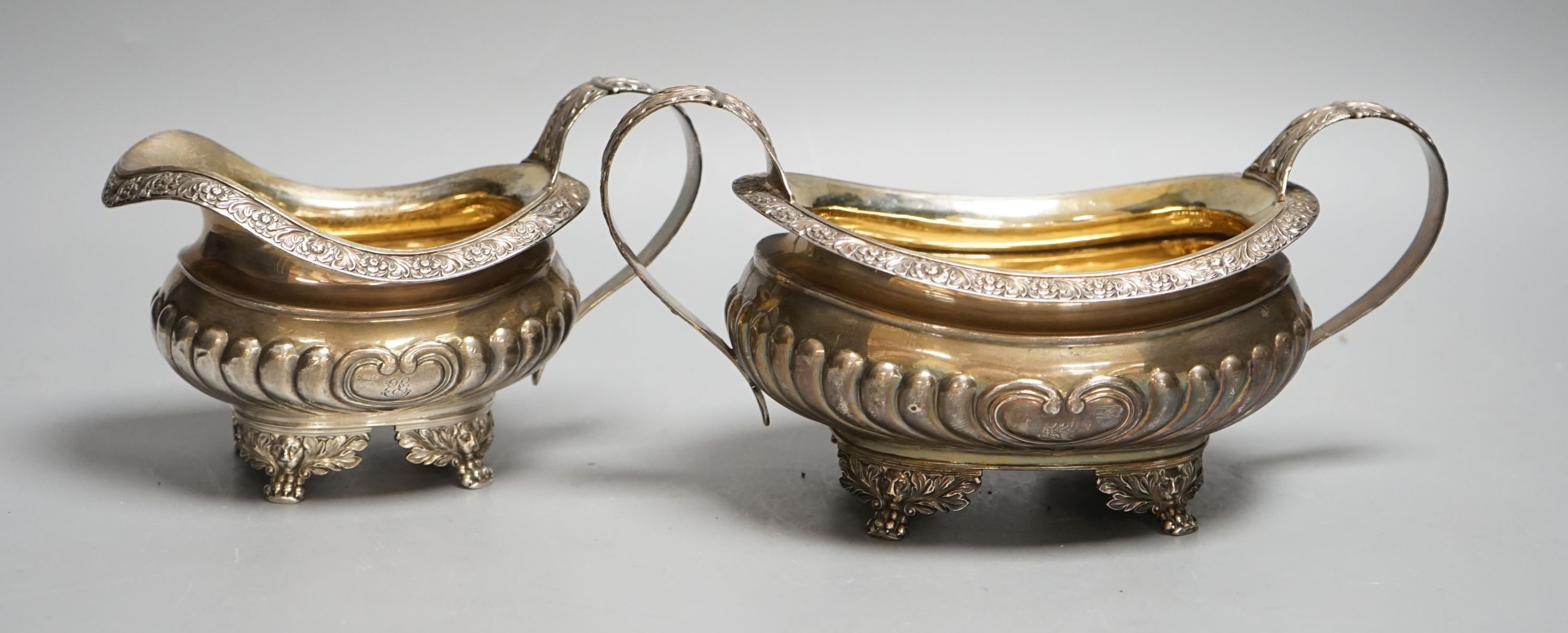 A late George III silver sugar bowl and cream jug, Robert Smeaton, Edinburgh, 1819, gross 19oz.